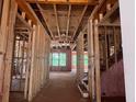 Unfinished home interior showcasing the stud framing and rough openings, ready for customization and finishing touches at 2759 S Waterworks Rd, Buford, GA 30518