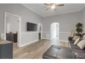 Spacious living room features gray walls, wood floors, and ample natural light at 752 Sw Cooper St Sw, Atlanta, GA 30315