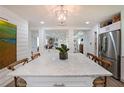Eat in kitchen features a large island with marble countertop at 167 Garden Ln, Decatur, GA 30030