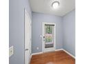 Bright room with door to the back and white trim and door at 2776 Snapfinger Mnr # 2776, Decatur, GA 30035