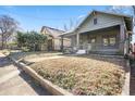 Street view of a charming single-story home with an inviting front porch and low-maintenance yard at 1050 Lawton Sw Ave, Atlanta, GA 30310