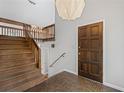 View of an open staircase with hardwood floors at 1279 Colony Pl, Marietta, GA 30068