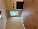 Cozy living room with hardwood floors, fireplace, and a large window at 1629 Marsanne Ter, Kennesaw, GA 30152