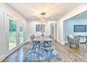 Elegant dining room with hardwood floors, stylish lighting, and modern decor at 2011 Lexington Ave, Atlanta, GA 30344