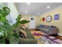 Cozy living room filled with natural light, a colorful rug, and stylish decor at 2011 Lexington Ave, Atlanta, GA 30344