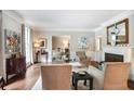 Elegant living room features a fireplace, neutral tones, and ample seating for comfortable living at 377 Camden Ne Rd, Atlanta, GA 30309