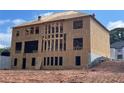 New home featuring framed construction of the rear exterior with a second story and basement at 3063 Reserve Ct Sw, Conyers, GA 30094