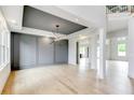 Stylish living room featuring hardwood floors, modern lighting, and architectural details at 3063 Reserve Ct Sw, Conyers, GA 30094