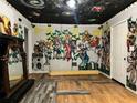 Living room with quirky art, wood look floors and unique decor at 1846 North Ave, Atlanta, GA 30318