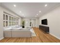 Bright and spacious living room with hardwood floors and large windows at 229 Devonwood Dr, Atlanta, GA 30328