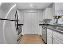 Kitchen featuring stainless steel appliances, plenty of counter space and white cabinets at 1101 Juniper Ne St # 619, Atlanta, GA 30309