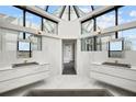 Elegant bathroom with dual vanities and luxury fixtures at 2828 Peachtree Nw Rd # P 3300, Atlanta, GA 30305