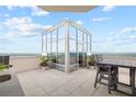 Relaxing patio with outdoor dining area and beautiful views at 2828 Peachtree Nw Rd # P 3300, Atlanta, GA 30305
