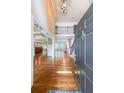 Spacious foyer with hardwood floors and natural light creates an inviting entrance to the home at 1403 Benbrooke Circle Northwest Nw Cir, Acworth, GA 30101