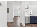 Bright kitchen featuring stainless steel appliances and dark wood flooring at 2277 Peachtree Ne Rd # 405, Atlanta, GA 30309