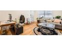 Spacious living area features hardwood flooring, stylish furniture, and an abundance of natural light from the window at 1284 Piedmont Ne Ave # 12, Atlanta, GA 30309