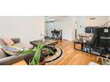 Open-concept living space with hardwood floors, a comfortable sofa, and seamless flow to other areas of the home at 1284 Piedmont Ne Ave # 12, Atlanta, GA 30309