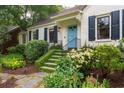 Inviting front entrance with landscaped steps leading to the home at 657 E Paces Ferry Ne Rd, Atlanta, GA 30305