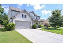 Charming two-story home with attached garage, manicured lawn, and inviting front porch at 110 Serendipity Way, Dallas, GA 30157