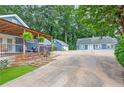 Desirable residence with a covered patio creates a perfect outdoor living area at 4002 Joshua Ln, Douglasville, GA 30135
