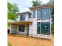 Exterior of home with large windows, under construction at 1111 Moreland Se Pl, Atlanta, GA 30316