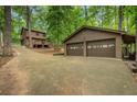 Detached two-car garage with a carport is connected by a long driveway at 2269 Sparrow Ridge Ne Dr, Marietta, GA 30066