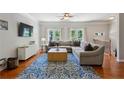 Bright living room with hardwood floors, ceiling fan and lots of natural light at 3895 Old Atlanta Station Se Dr # 1, Atlanta, GA 30339