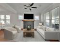Bright living room with a stylish fireplace, modern furniture, and hardwood floors at 265 Haas Se Ave, Atlanta, GA 30316