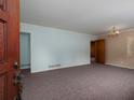 Spacious living room with neutral paint and plush carpeting; great flow at 286 Sequoia Ne Dr, Marietta, GA 30060