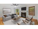Cozy living room with fireplace, plush seating, and natural light from the sliding glass door at 1404 N Crossing Ne Dr, Atlanta, GA 30329