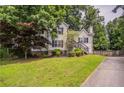 Charming two-story home with front yard landscaping, stone accents at 962 Taylors Farm Ct, Canton, GA 30115