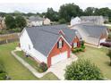 Aerial view showcasing the home's roof, well-maintained lawn, and surrounding neighborhood at 2645 Barkley Manor Dr, Lawrenceville, GA 30044