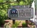 Welcome to Virginia Highland sign with trees and greenery around it at 1026 Saint Charles Ne Ave # 15, Atlanta, GA 30306