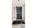 A protected porch leads to a steel front door, offering security and curb appeal at 200 Fox Hall Court Ct, South Fulton, GA 30349