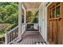 Inviting front porch with a swing, offering a cozy and relaxing outdoor space at 2505 Midway Rd, Decatur, GA 30030