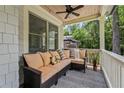 Comfortable side porch with cushioned seating, perfect for enjoying the outdoors at 2505 Midway Rd, Decatur, GA 30030