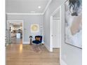 Stylish foyer with hardwood floors, elegant decor, and open access to living spaces at 1363 Jonesboro Se Rd, Atlanta, GA 30315