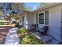 Inviting home exterior with cozy front porch seating and lush landscaping at 705 Stewart Nw Cir, Marietta, GA 30064