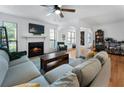 Spacious living room featuring a fireplace, large sectional sofa, and stylish decor at 1274 Branch Dr, Tucker, GA 30084