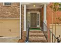 Stylish front entrance featuring a brick facade, leading to a welcoming front door at 630 Birch River Ln, Lawrenceville, GA 30043