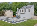 Contemporary home showcasing meticulous landscaping and striking architectural design at 2683 Tritt Springs Ne Trce, Marietta, GA 30062