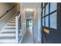 Bright hallway with staircase and modern finishes showcasing the inviting interior at 6700 Roswell Rd # 21E, Sandy Springs, GA 30328