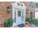 Close-up of the elegant front door featuring decorative glass, sidelights, and a welcoming entrance at 366 Coopers Pond Dr, Lawrenceville, GA 30044