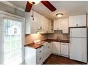 Cozy kitchen with white cabinets and ample counter space at 3993 Forrest Ct, Atlanta, GA 30341