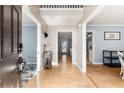 Inviting foyer with hardwood floors and views into multiple rooms at 4913 Farm Valley Ne Dr, Woodstock, GA 30188