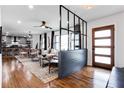 Bright open-concept living room with hardwood floors and stylish modern design features at 2047 Seavey Dr, Decatur, GA 30032