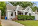 Charming craftsman home featuring a cozy front porch and manicured landscaping at 764 Stokeswood Se Ave, Atlanta, GA 30316