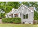 Charming craftsman home featuring a cozy front porch and manicured landscaping at 764 Stokeswood Se Ave, Atlanta, GA 30316