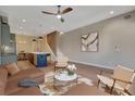 Open-concept living space with modern furnishings, hardwood floors, and pendant lighting at 454 Connally Se St, Atlanta, GA 30312