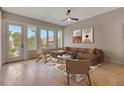 Bright living room with large windows, hardwood floors, and modern decor at 454 Connally Se St, Atlanta, GA 30312